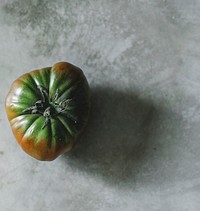 Fresh organic green heirloom tomato