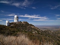 Some of several observatory buildings at the Kitt Peak National Observatory in the Quinlan Mountains in the Arizona-Sonoran Desert on the Tohono O&#39;odham Nation near Tucson, Arizona.