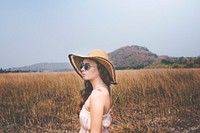 Photo of a woman traveling and visiting nature landscape