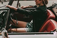Woman driving convertible car, aesthetic road trip photo