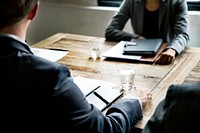 Business people sat in a meeting 