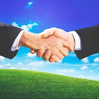 Close up of two businessmen shaking hands