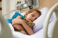 Young Caucasian girl staying at a hospital