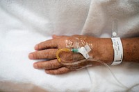 Closeup of hand with IV tube
