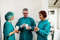 Doctors talking together during break time