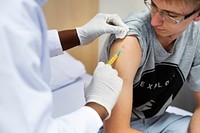 Young man having a vaccination