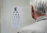 An elderly patient is having sight testing