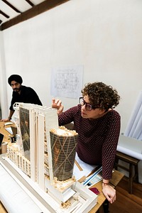 Woman working on model example for work