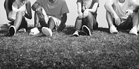 Group of friends sitting on the grass