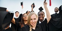 Group of diverse students graduating