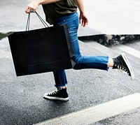 Woman carrying a shopping bag