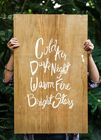 A wooden advertise board