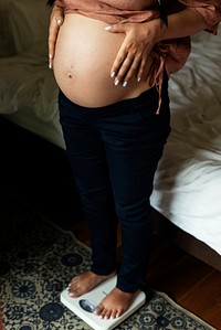 A pregnant woman scale