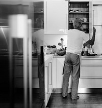 A man cooking in the kitchen