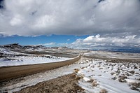A lightly traveled road cuts through the high plains a winter&#39;s day in rugged and remote Fremont County, Wyoming. Original image from <a href="https://www.rawpixel.com/search/carol%20m.%20highsmith?sort=curated&amp;page=1">Carol M. Highsmith</a>&rsquo;s America, Library of Congress collection. Digitally enhanced by rawpixel.