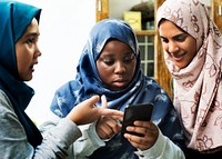 Group of students using mobile phone