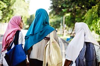 Group of Muslim school girls walking together outside
