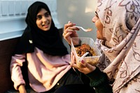 Group of Muslim girls having lunch together