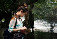 Asian woman enjoying an outdoor trip