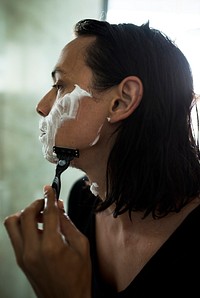 A Western man shaving in the morning