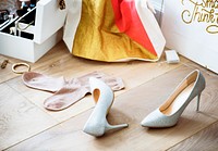 Closeup of heels lying on the wooden floor