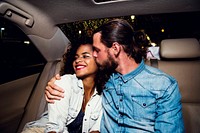 Couple in a backseat