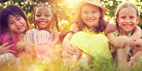 Group of diverse kids playing in the park