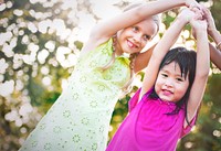 Cute diverse kids playing in the park