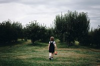 Little girl playing in a farm