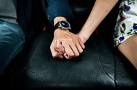 Asian couple holding hands