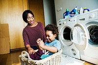 Mother and son doing housework together