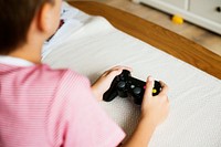 Young boy playing game