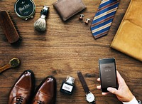 Flatlay view of a businessman&#39;s collection of objects used daily