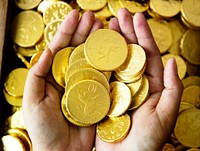 Wealthy people with golden coins