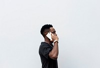 African man using mobile phone