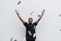 A wealthy African man throwing away his money
