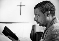 A man reading a bible
