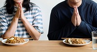 Asian couple about to eat noodles
