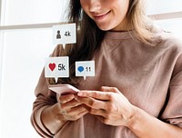 Woman using a smartphone social media conecpt