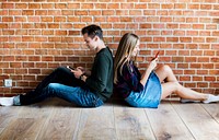 Young couple addicted to smartphone and social media