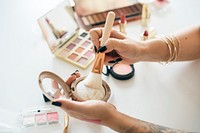 Beauty blogger producing makeup tutorial