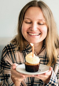 Caucasian girl with birthday cake