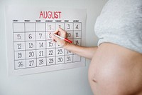 Pregnant woman counting down for delivery date