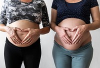 Pregnant women showing their bumps