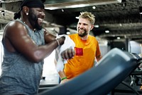 People exercising at fitness gym