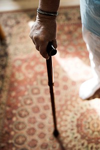 Senior woman using a cane