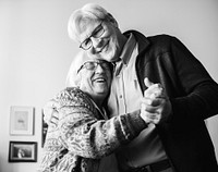 Black and white photo of senior couple dancing