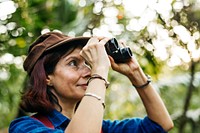 Woman using binoculars