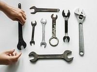 Flat lay of various wrench isolated on white background