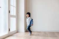 A cheerful Asian girl in new house